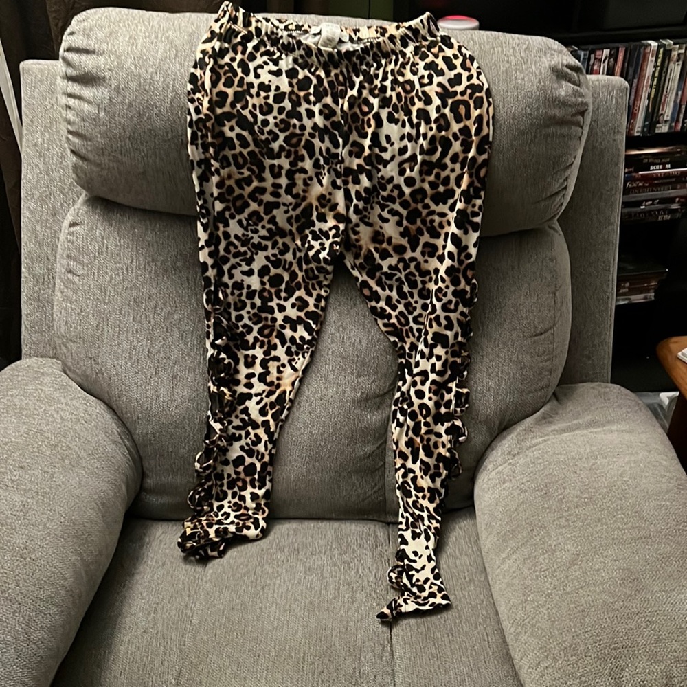 Leopard Print leggings with peekaboo holes up the sides.